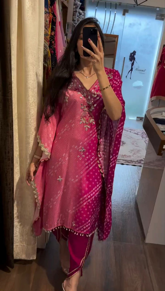 Aarjuu Double shade kaftan with gota detailing paired with tulip pant.