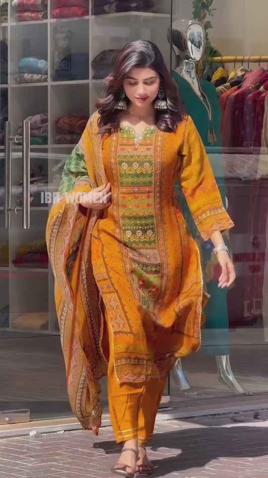 Niwaj yellow muslin handwork three pic suit set for women.